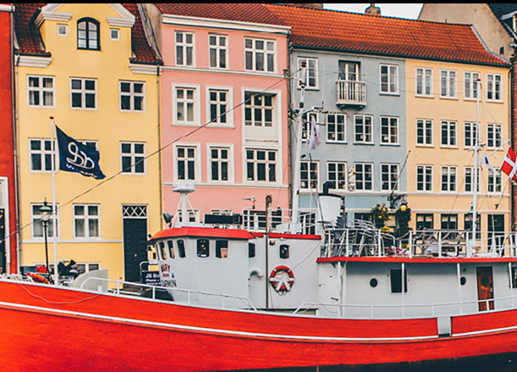 A view of the colorful house spanning the harbor in Copenhagen.