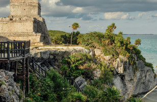 The ancient ruins of Tulum standing vigil over the Mexico shoreline.