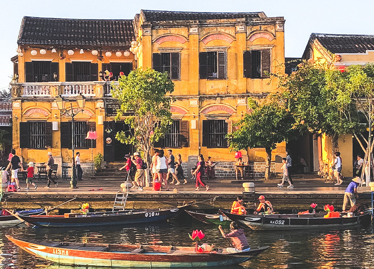 A view of the Hoi An's Riviera and the ancient town on the riverside from the colonial era.