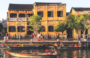 A view of the Hoi An's Riviera and the ancient town on the riverside from the colonial era.