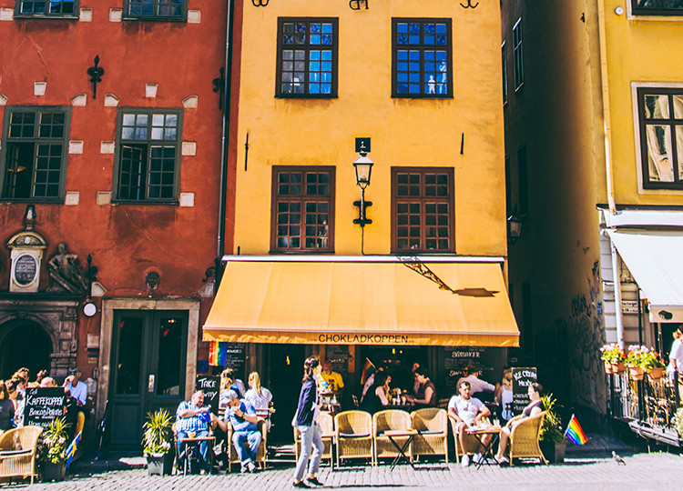Colorful buildings line the busy streets of Stockholm.