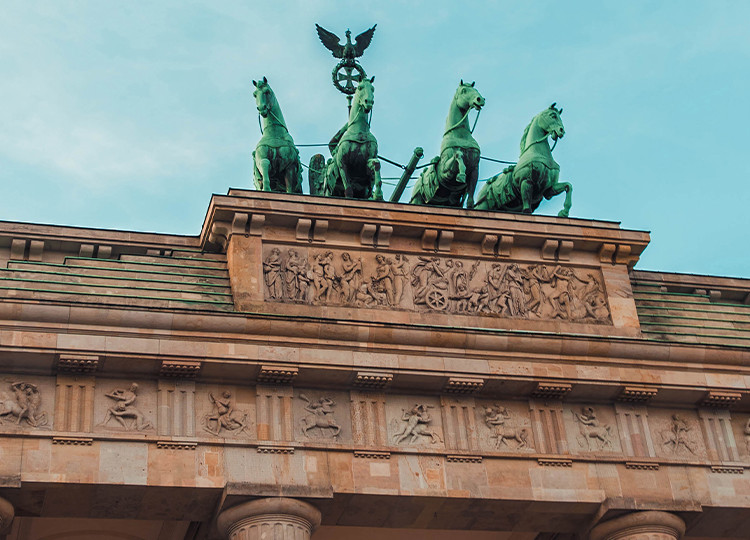 A view of the top of the iconic Brandenburg Gate in Berlin.