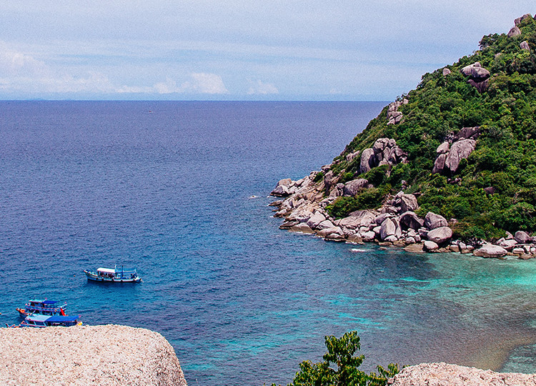 Topdeck Travelers overlooking one of Thailand's beautiful islands.