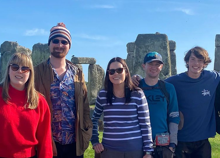 Topdeck group in front of Stonehenge